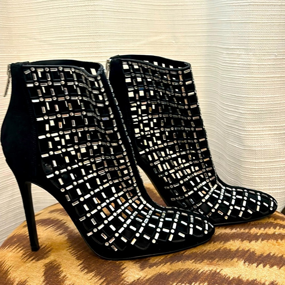 Black suede heeled booties with faux diamonds by Guess